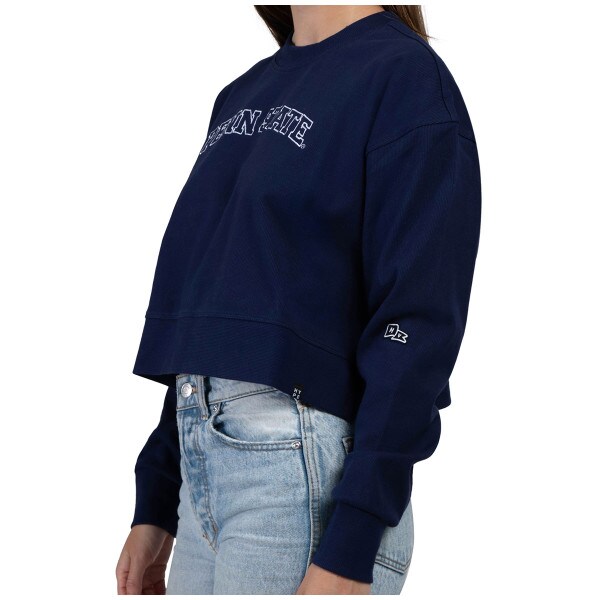 side view of model wearing women's navy crew sweatshirt with stitched Penn State across chest